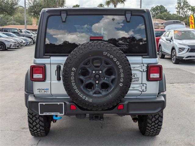 used 2023 Jeep Wrangler 4xe car, priced at $29,936