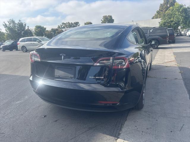 used 2022 Tesla Model 3 car, priced at $26,500