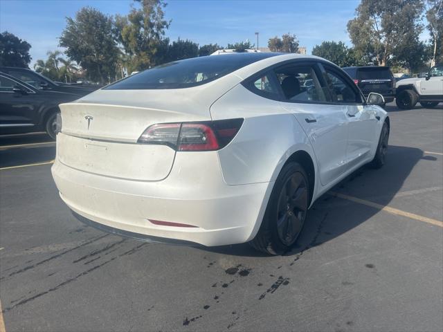 used 2023 Tesla Model 3 car, priced at $26,143