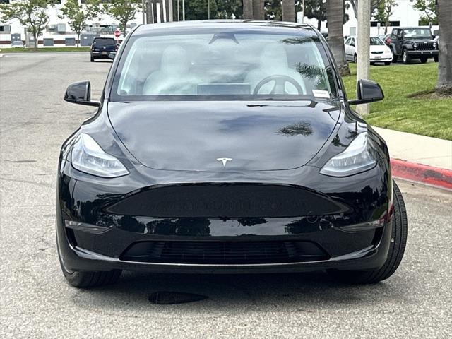 used 2025 Tesla Model Y car, priced at $42,600
