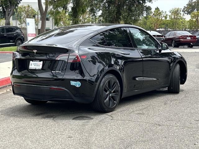 used 2025 Tesla Model Y car, priced at $42,600