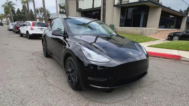 used 2025 Tesla Model Y car, priced at $42,600