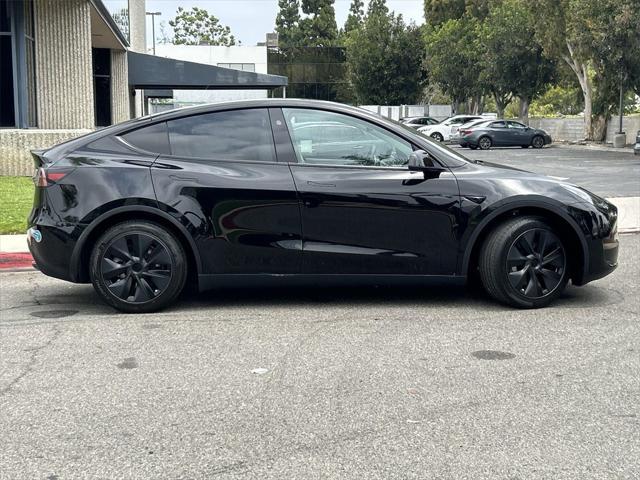 used 2025 Tesla Model Y car, priced at $42,600