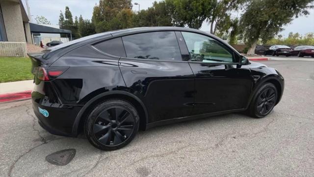 used 2025 Tesla Model Y car, priced at $42,600