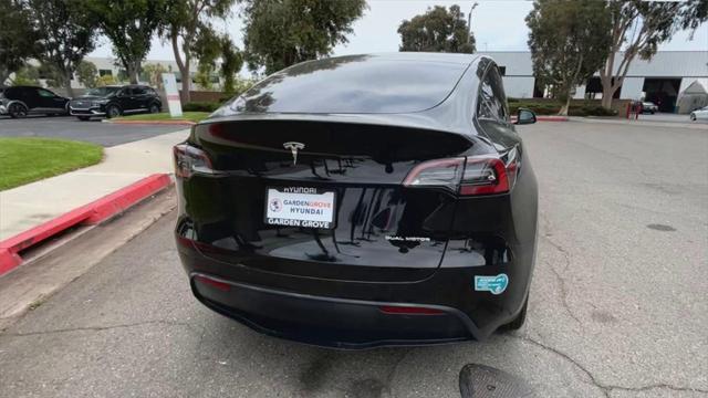 used 2025 Tesla Model Y car, priced at $42,600