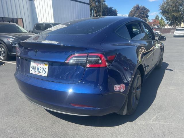 used 2023 Tesla Model 3 car, priced at $26,176