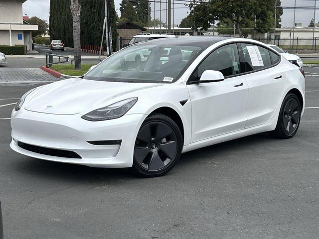 used 2022 Tesla Model 3 car, priced at $28,298