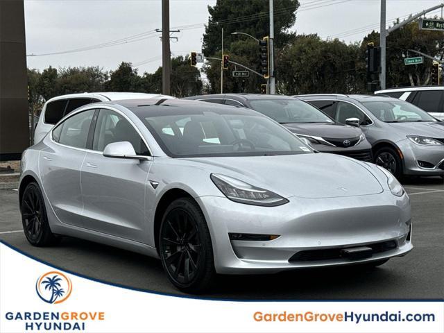 used 2018 Tesla Model 3 car, priced at $22,500