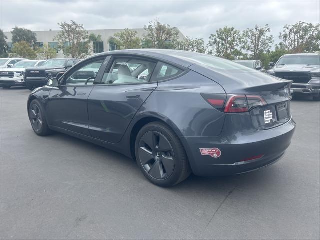 used 2023 Tesla Model 3 car, priced at $27,722