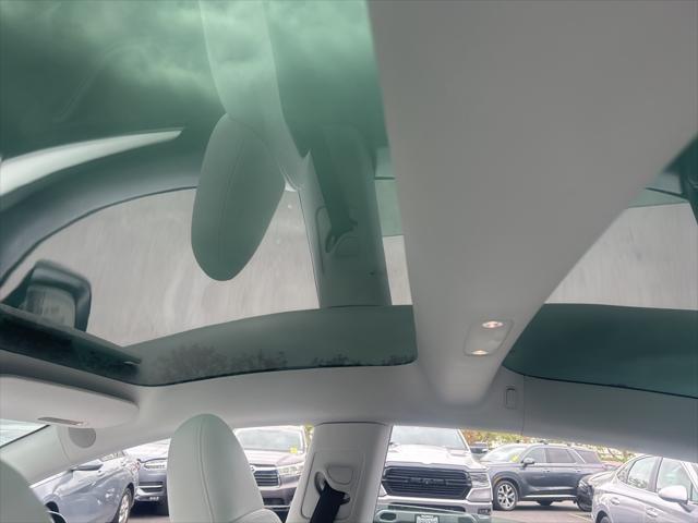 used 2023 Tesla Model 3 car, priced at $27,722