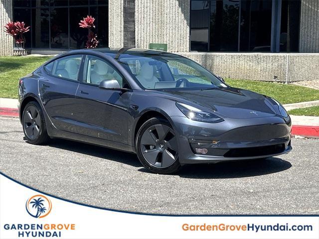 used 2023 Tesla Model 3 car, priced at $27,700