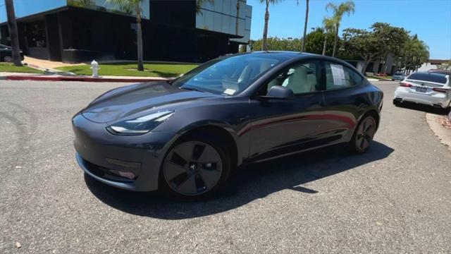 used 2023 Tesla Model 3 car, priced at $27,700