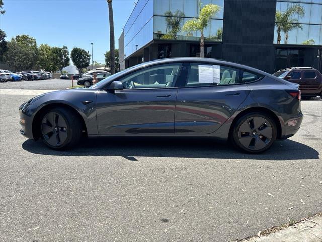used 2023 Tesla Model 3 car, priced at $27,700