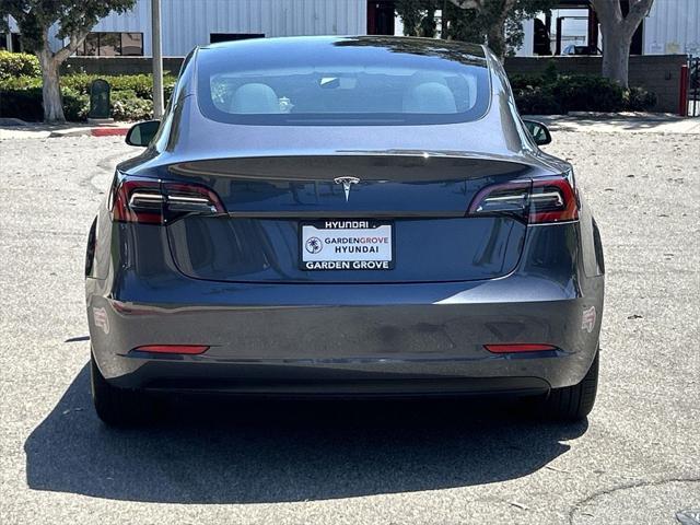 used 2023 Tesla Model 3 car, priced at $27,700