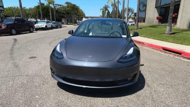 used 2023 Tesla Model 3 car, priced at $27,700