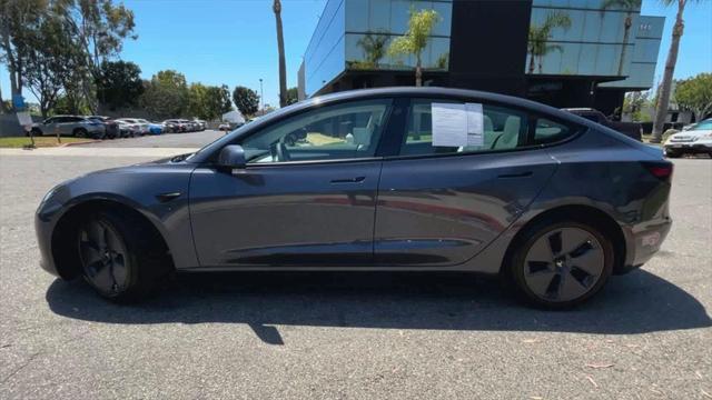 used 2023 Tesla Model 3 car, priced at $27,700