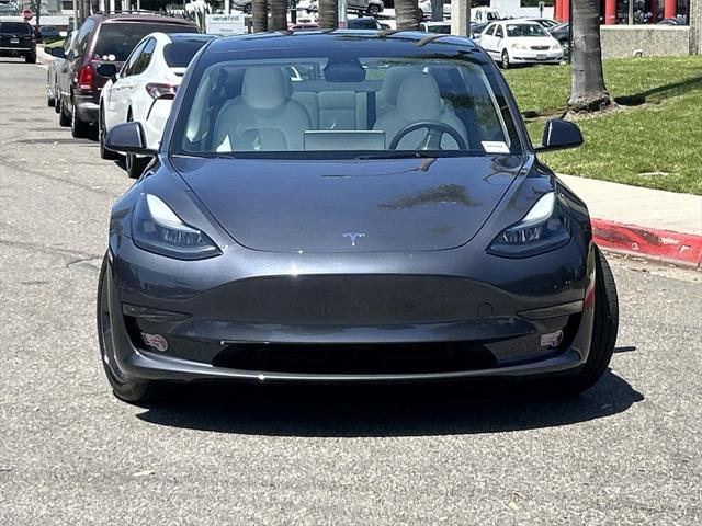 used 2023 Tesla Model 3 car, priced at $27,700