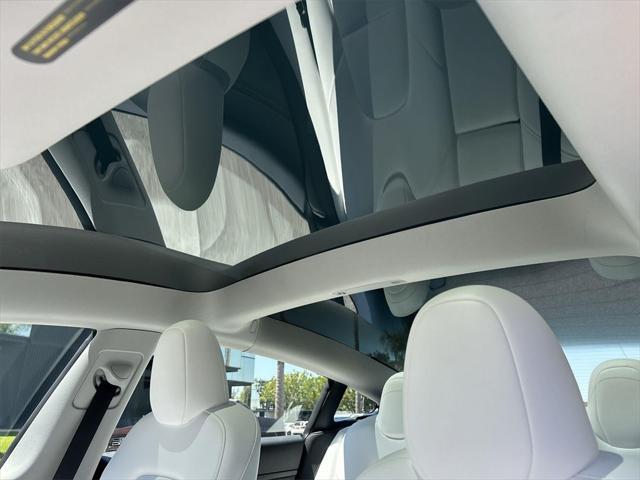 used 2023 Tesla Model 3 car, priced at $27,700