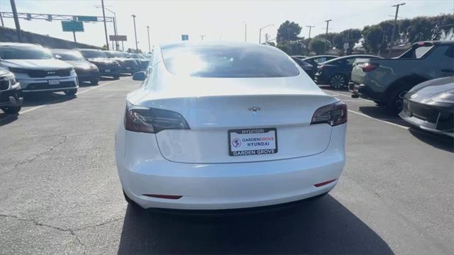 used 2023 Tesla Model 3 car, priced at $27,000