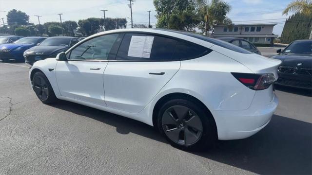 used 2023 Tesla Model 3 car, priced at $27,000