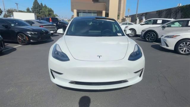 used 2023 Tesla Model 3 car, priced at $27,000