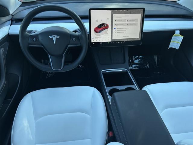 used 2023 Tesla Model 3 car, priced at $27,772