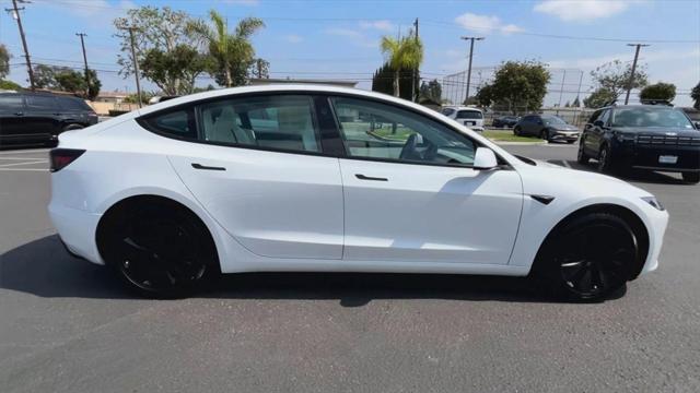 used 2024 Tesla Model 3 car, priced at $32,500