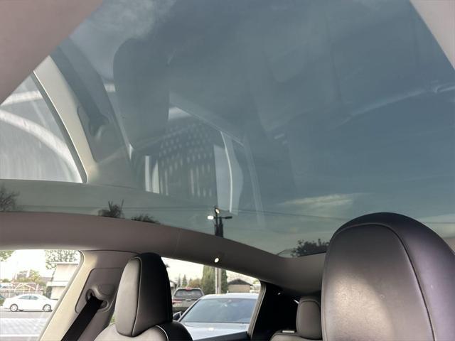used 2023 Tesla Model Y car, priced at $30,900