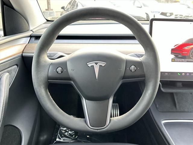 used 2023 Tesla Model Y car, priced at $30,900