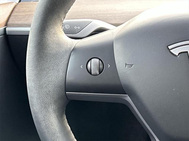 used 2023 Tesla Model Y car, priced at $30,900