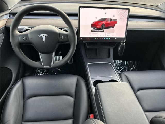 used 2023 Tesla Model Y car, priced at $30,900