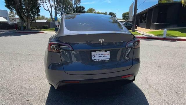 used 2023 Tesla Model Y car, priced at $32,550