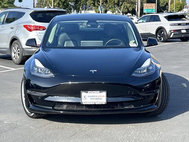 used 2022 Tesla Model 3 car, priced at $23,550