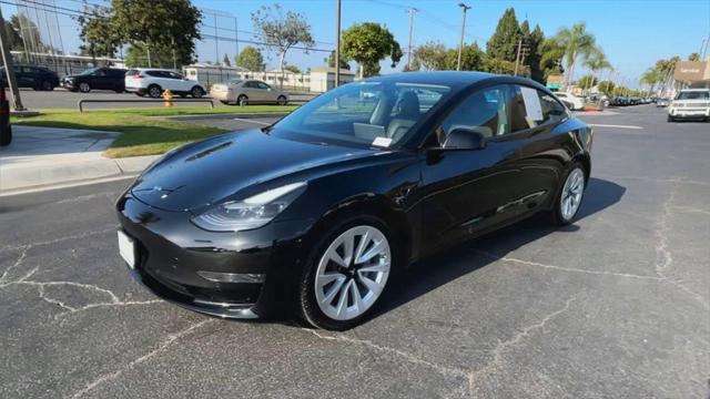 used 2022 Tesla Model 3 car, priced at $23,550