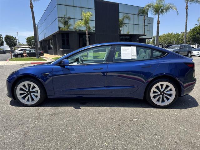 used 2022 Tesla Model 3 car, priced at $28,000