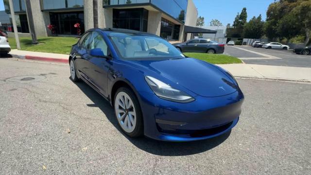 used 2022 Tesla Model 3 car, priced at $28,000