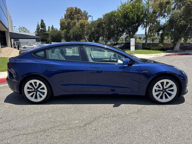 used 2022 Tesla Model 3 car, priced at $28,000