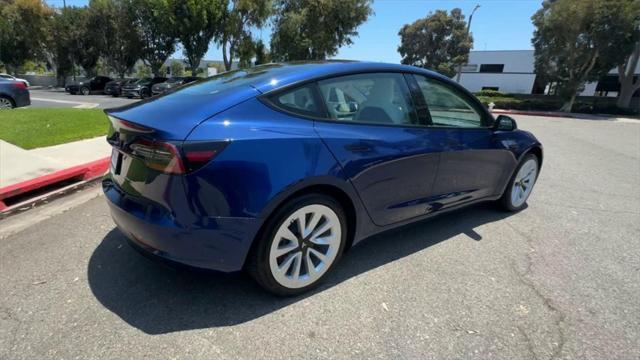 used 2022 Tesla Model 3 car, priced at $28,000