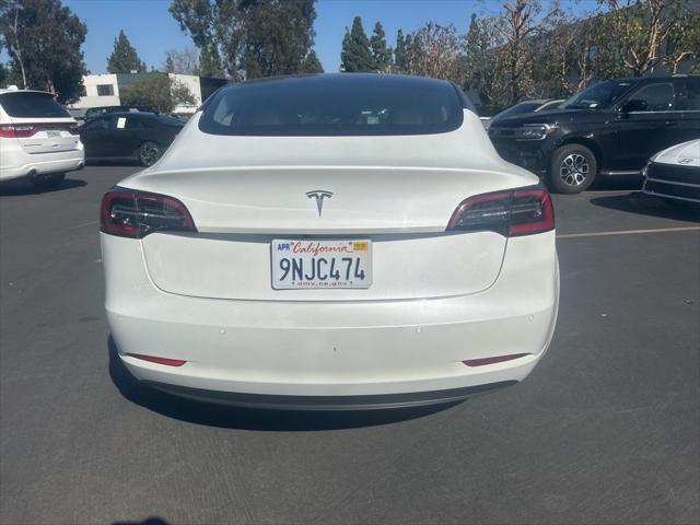 used 2021 Tesla Model 3 car, priced at $22,500