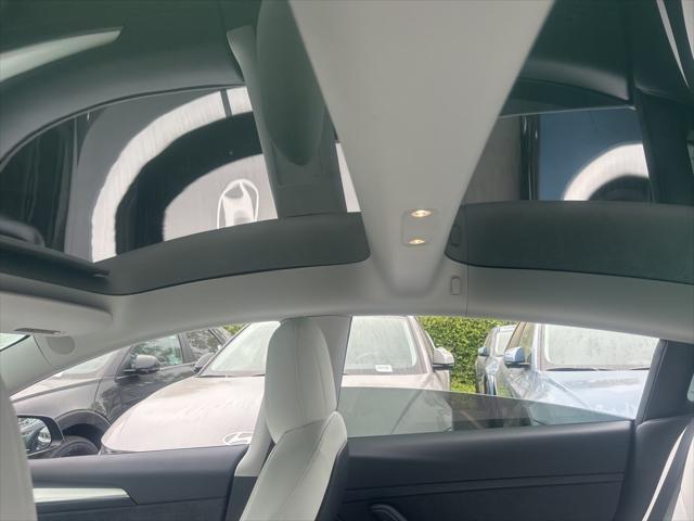 used 2022 Tesla Model 3 car, priced at $29,550