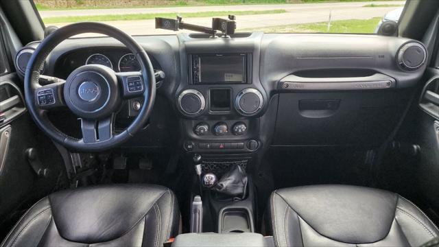 used 2013 Jeep Wrangler Unlimited car, priced at $15,495