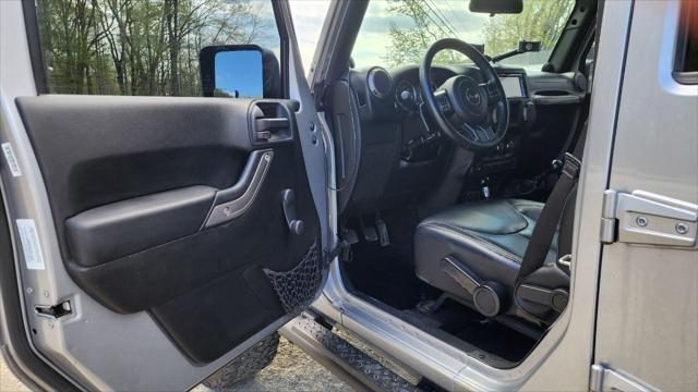 used 2013 Jeep Wrangler Unlimited car, priced at $15,495