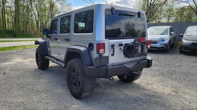 used 2013 Jeep Wrangler Unlimited car, priced at $15,495