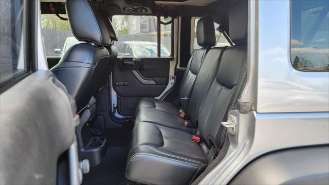 used 2013 Jeep Wrangler Unlimited car, priced at $15,495