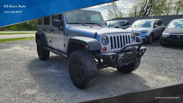 used 2013 Jeep Wrangler Unlimited car, priced at $16,695