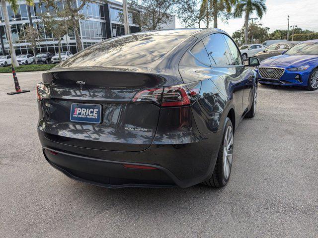 used 2024 Tesla Model Y car, priced at $36,995