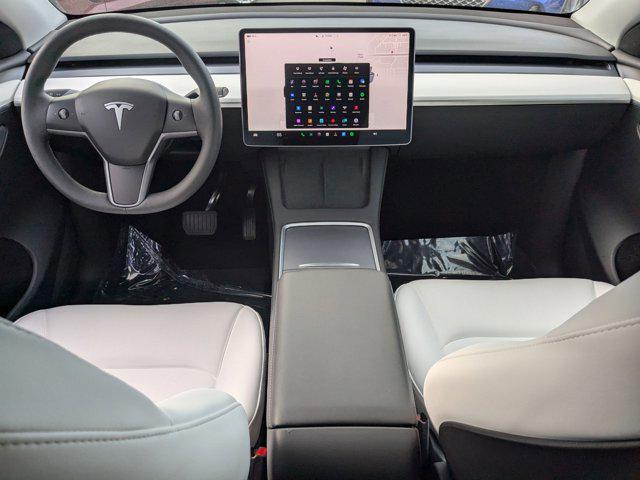 used 2024 Tesla Model Y car, priced at $36,995