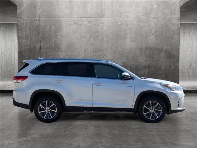 used 2019 Toyota Highlander Hybrid car, priced at $28,441