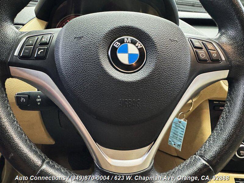 used 2015 BMW X1 car, priced at $7,497