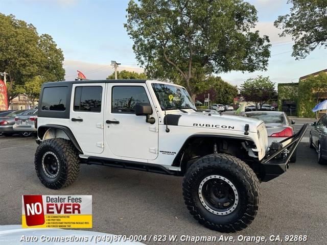 used 2014 Jeep Wrangler Unlimited car, priced at $23,497